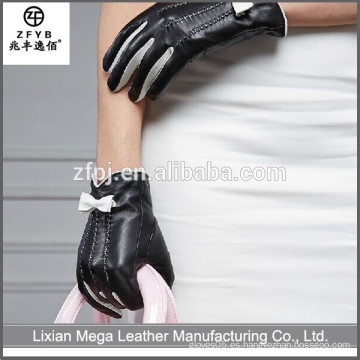 Nuevos guantes de cuero del precio bajo de la manera del diseño con el arco